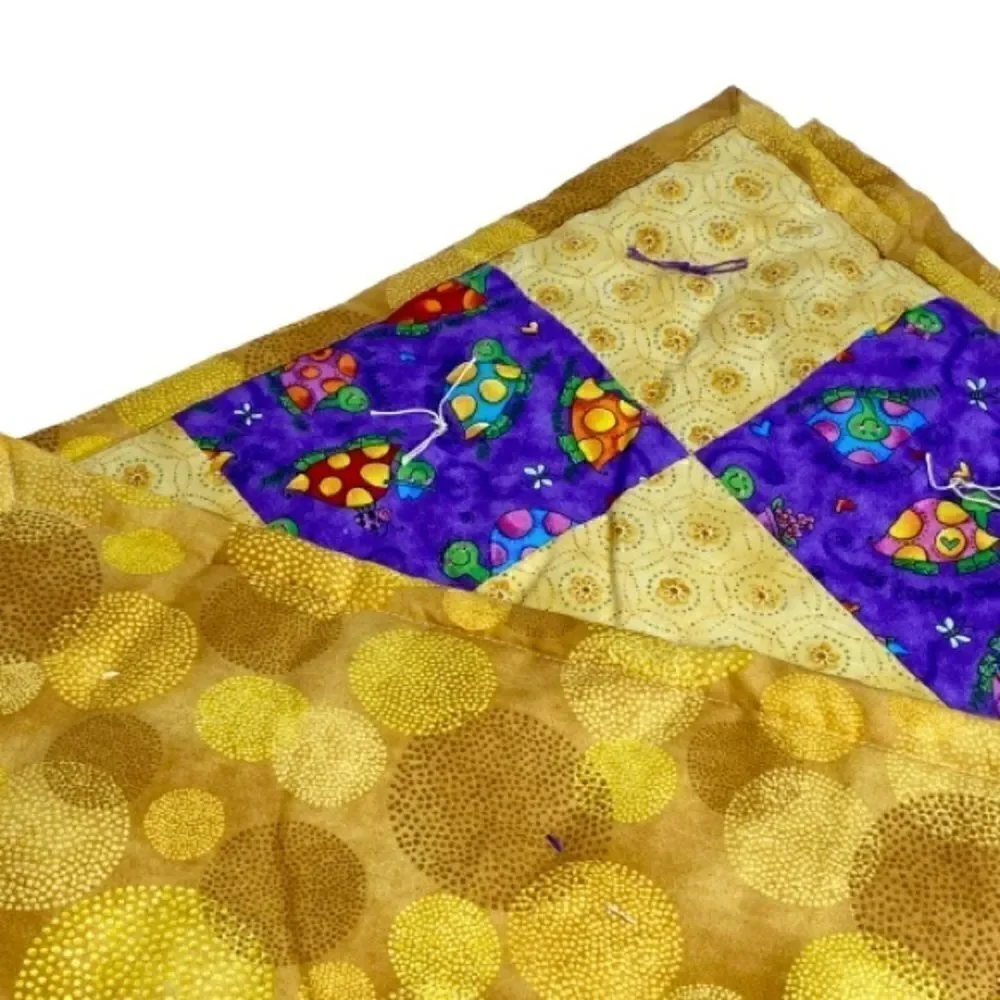 Handmade NWT turtle themed purple and gold baby or lap quilt size 43” X 38”